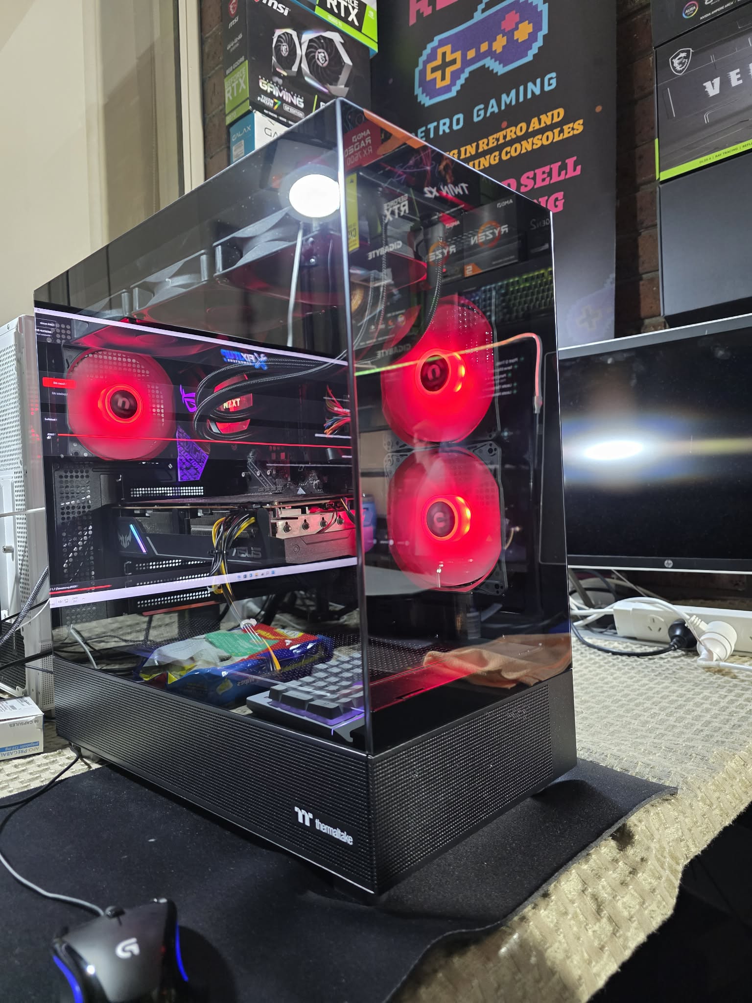 A black FixItUp PC build with red lighting
